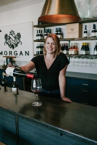 Melissa Askew pouring wine at Taste Morgan in Carmel